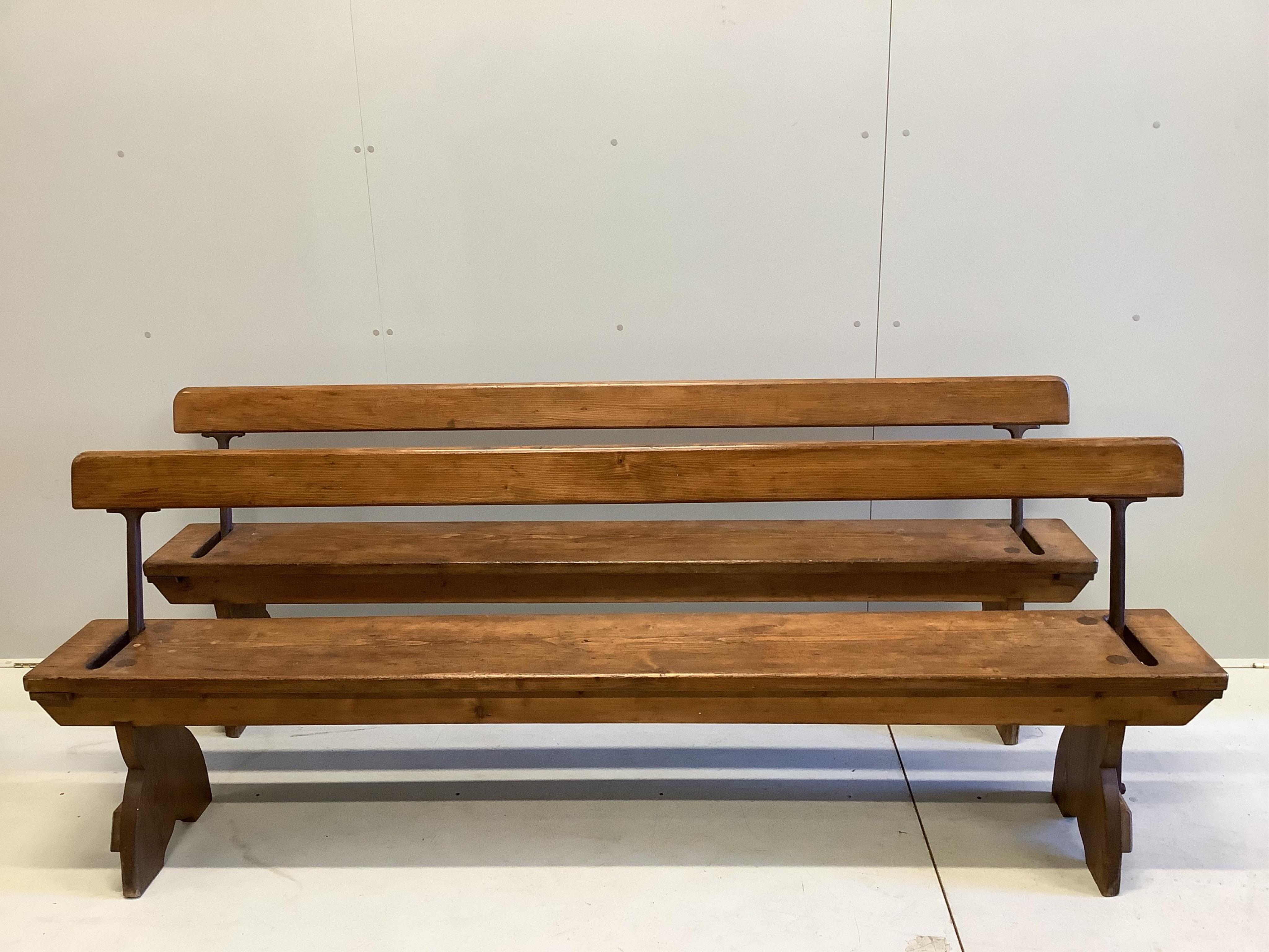 A pair of late 19th / early 20th century pine station benches, width 213cm, depth 33cm, height 77cm. Condition - good